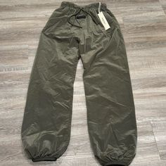 Essentials Fear Of God Ink Trackpants Sweatpants Nwt Msrp $130 Men’s Size: Xs Brand New Never Worn With Tags Accepting Offers Sporty Khaki Full-length Pants, Sporty Khaki Pants, Sporty Full Length Khaki Pants, Sporty Khaki Trousers, Sporty Straight Leg Khaki Pants, Khaki Athleisure Pants For Streetwear, Sporty Khaki Pants For Fall, Sporty Khaki Tapered Leg Bottoms, Khaki Athleisure Bottoms For Streetwear