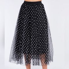 Polka Dot Pattern, Layered Tulle Skirt Midi Length, Elastic Waistband Black With Small White Dots A-Line Skirt Length Is 31" With A 26" Black Slip Lining Spring Polka Dot Midi Skirt, Polka Dot Pleated Party Skirt, Polka Dot Pleated Skirt For Party, Polka Dot Tiered Lined Skirt, Pleated Polka Dot Skirt For Party, Polka Dot Lined Summer Skirt, Polka Dot Tiered Skirt For Spring, Party Polka Dot Pleated Skirt, Polka Dot Lined Skirt Bottoms For Spring