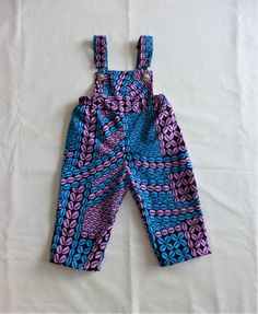 Wax overalls available from 3 months to 3 years Lining of your choice: jersey or cotton voile depending on the season Cute Blue Overalls For Playwear, Cotton Overalls Jumpsuit For Playtime, Playful Cotton Overalls For Playwear, Cute Cotton Bib Front Overalls, Pink Cotton Jumpsuits And Rompers For Playwear, Purple Cotton Bubble Romper For Spring, Blue Cotton Jumpsuits And Rompers For Playwear, Blue Cotton Jumpsuits And Rompers, Cotton Bubble Romper Overall For Playwear