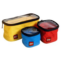 three lego lunch bags are lined up together