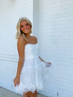 Get ready to turn heads in our White Ruffled Lace Mini Dress. Made with delicate lace, this dress features charming ruffles and elegant sequins for a touch of sparkle. Perfect for any special occasion, this dress will make you feel confident and beautiful all night long. Black Tie Wedding, Lace Mini Dress, Dress Romper, Feel Confident, Black Tie, Make You Feel, Ruffles, Special Occasion, Lounge Wear