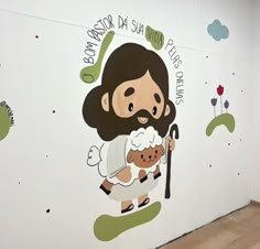 there is a mural on the wall of a child's room with jesus and sheep