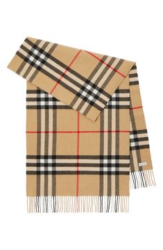 A bold archival check lends signature distinction to a supremely soft cashmere scarf tipped with slim fringe. 79" x 20"; 3" fringe 100% cashmere Dry clean Made in the UK Giant Check, Personalized Scarves, Burberry Scarf, White Scarves, Checked Scarf, British Outfits, Personalized Gifts For Kids, Cotton Hoodie, Cashmere Scarf