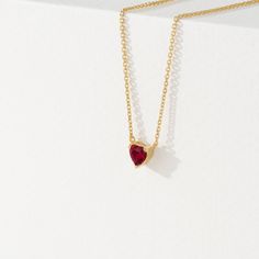 Corin Ruby is a stone of royalty, highly coveted for its rich red hue. This ruby was meticulously cut into the most subtle of hearts so you can wear it every day. It layers well with other dainty necklaces, and alone it almost looks like it is floating on your neck. This is the perfect gift for a girlfriend, daughter, granddaughter or even bridesmaid. - Handmade- Solid Gold- Natural Ruby- Pendant Size: 5 mm- Total Ruby Carat Weight: .40 ctw All Sarah Elise ruby jewelry come beautifully boxed in Formal Heart Cut Birthstone Necklace, Fine Jewelry Red Ruby Necklace, Elegant Heart Cut Ruby Necklaces, Dainty Ruby Gemstone Necklace, Red Gemstone Necklace For Valentine's Day, Red Birthstone Necklace With Lab-created Ruby, Elegant Heart-shaped Ruby Necklace, Formal Heart Cut Ruby Necklaces, Formal Ruby Heart Cut Necklace