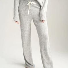 Never Been Worn Size Xs Carly Jean Lounge Pants In Heather Gray So Magical And Soft, The Capri Bottoms Take Loungewear To The Next Level! The Waffle Knit Hugs The Body Gently, While Offering Maximum Comfort! Paired With The Capri Long Sleeve, These Pants Are An Essential For Out-And-About Days Or Lazy Weekends. Width: 13" Length: 39" Inseam: 30" Rise: 10.5" Long Fit Adjustable Tie Waist Waffle Knit 48% Cotton 48% Modal 4% Spandex Comfy Full-length Pants, Cozy Bottoms For Relaxation, Cozy Sleep Pants With Elastic Waistband, Comfy Straight Leg Bottoms, Cozy Straight Leg Bottoms For Loungewear, Cozy Straight Leg Loungewear Bottoms, Comfortable Sweatpants For Daywear, Cozy Long Pants For Loungewear, Cozy Loungewear Bottoms