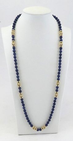 Presented is a lovely, long 14 karat yellow gold and natural sodalite stone beaded necklace made during the late 1900s. The blue stone beads are individually knotted and the gold beads are done in a neat ridged style. There are 36 gold beads and they comprise a significant portion of the total weight of the necklace. We estimate there is between 12 and 16 grams in just gold weight. The gold beads have been tested and are guaranteed to be 14 karat purity. This necklace is in excellent condition. Beads Necklace Design, Bead Necklace Designs, Long Beaded Necklaces, Diy Jewelry Necklace, Beaded Necklace Designs, Beaded Jewelry Designs, Stone Beaded Necklace, Jewelry Design Necklace, Beaded Jewelry Diy