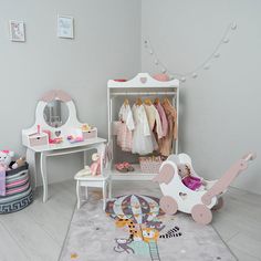 a child's bedroom with toys and decor