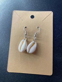 Cute sea shell earrings Shell Dangle Hoop Earrings For Beach, Casual Shell Jewelry Gift, Silver Shell-shaped Earrings, Nickel-free Shell Gift, Ocean-inspired Shell Earrings For Gifts, Ocean-inspired Shell-shaped Earrings For Gifts, Ocean-inspired Drop Shell Earrings, Beach Drop Clip-on Earrings, Elegant Shell-shaped Earrings For Vacation