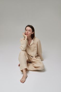 Women's pajama set from organic linen fabric is cozy and comfy. In this pajama, you will be able to properly relax and rest, you will see sweet dreams and smile with joy at the morning sun when you wake up. Set includes: SHIRT 1 side pocket Notched collar Long sleeves Belt  Unique buttons made from seashells PANTS Straight fit Elasticated waist band 2 side pockets All suit with cotton edging Custom sizes are available Made of 100% natural linen, Oeko-Tex certified, free of harmful chemicals. It keeps the temperature of the body + -4 degrees, these clothes are not hot in summer and not cold in winter. Linen allows the skin to breathe, is an anti-allergenic and is not electrified. This is a wear-resistant material and could be washed a lot of times. Care: Wash at 30-40℃ (104℉) degrees with a Relaxed Fit Sleepwear, Beige Relaxed Fit Sleepwear Sets, Casual Linen Sleepwear For Pajama Party, Linen Sleepwear For Pajama Party In Relaxed Fit, Linen Sleepwear For Pajama Party With Relaxed Fit, Linen Sleepwear For Pajama Party, Beige Relaxed Fit Sleepwear For Lounging, Linen Long Sleeve Sleepwear For Pajama Party, Long Sleeve Linen Sleepwear For Relaxation