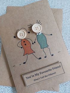 two greeting cards with buttons that say you're my favorite friend don't tell the others