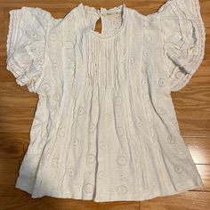 Anthropologie Eyelet Blouse. 100% Cotton. Xs. Fits Loose. Jersey Fabric (Not Woven). White. Never Worn. Casual Lace Top Blouse With Ruffle Sleeves, Casual Blouse With Lace Top And Ruffle Sleeves, Feminine Puff Sleeve Tops For Beach, Casual Short Sleeve Lace Top For Spring, Cotton Puff Sleeve Top For Beach, Cotton Flutter Sleeve Top For Brunch, Casual White Blouse With Ruffle Sleeves, Spring Lace Top With Ruffle Sleeves, White Ruffle Sleeve Top For The Beach