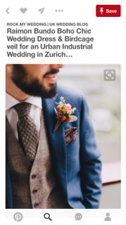 a man wearing a suit and tie with flowers in his lapel is seen on instagram