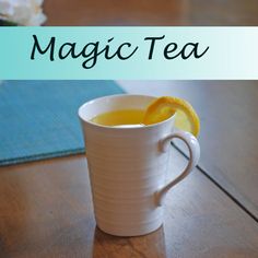 a cup of tea with lemon wedges on the side and text overlay reading magic tea