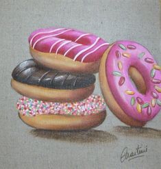 a painting of donuts with sprinkles on them