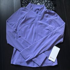 Brand New With Tags Lululemon Nulu Cropped Define Jacket Color Dark Lavender (Dkla) Size 12 Sold Out! Please Note I Do Not Accept/Respond To Low Ball Offers Reasonable Offers Only Please And Thank You Guaranteed Authentic 5 Star Top Rated Seller Next Day Shipping B767 Lululemon Define Jacket Purple, Purple Long Sleeve Winter Activewear, Purple Long Sleeve Athleisure Activewear, Purple Long Sleeve Activewear For Gym, Purple Athleisure Activewear For Fall, Purple Long Sleeve Gym Activewear, Purple Fall Activewear For Gym, Winter Sports Activewear In Purple, Purple Long Sleeve Stretch Outerwear