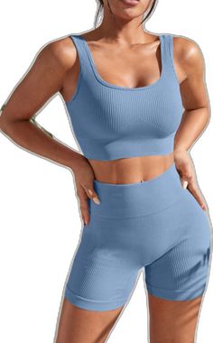 Blue Ribbed Athleisure Tops, Fitted Blue Ribbed Activewear, Fitted Ribbed Blue Activewear, Blue Ribbed Workout Top, Blue Ribbed Sporty Tops, Blue Activewear For Loungewear, Casual Ribbed Activewear For Workout, Casual Ribbed Activewear For Gym, Solid Color Ribbed Athleisure Activewear