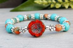 Blue and Orange Hippie Bracelet | by StoneRiverJewelry Hippie Bracelet, Colorful Nature, Hippie Bracelets, Orange And Turquoise, Turquoise Howlite, Natural Gifts, Blue And Orange, Flower Bracelet, Nature Bracelets