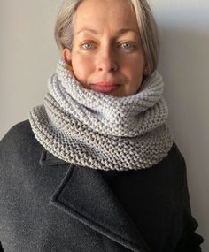 Gray Knitted Snood Wool Imagine a stylish and elegant accessory that will become your faithful companion during the cold season. This is a snood--an amazing embodiment of warmth and comfort. It's crafted from the softest yarn, gently enveloping your skin and wrapping you in softness and coziness. This snood comes in beautiful shades, ranging from warm earthy tones to delicate pastels, creating a sense of harmony and tranquility. The uniqueness of this snood lies in its versatility. Thanks to its special design, it can be worn not only as a classic scarf but also transformed into an elegant headpiece. Simply wrap it around your neck and pull it over your head, and you're ready to conquer the winter streets in an "ice queen" style. This accessory is perfect for those who value style and comf Merino Wool Knitting Pattern For Winter, Winter Merino Wool Knitting Pattern, Winter Knitting Pattern In Gray, Gray Knit Knitting Pattern, Cozy Gray Winter Knitting Pattern, Cozy Acrylic Yarn Knitting Pattern, Gray Chunky Knit Knitting Pattern, Cold Weather Knitting Pattern, Winter Soft Knit One Size Knitting Pattern