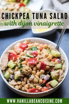 chickpea tuna salad with dijon vinaigrete in a white bowl