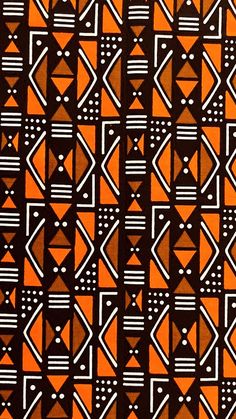 an orange and black geometric pattern with white dots on it's side, in the middle