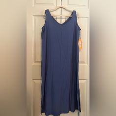 This Is A Sleeveless Cotton Gauze Dress With An Embroidered Strap And A Ruffled Hemline. It Is New With Tags. Measurements: Center Front Length 42" Bust 44'| Sleeveless Summer Maxi Dress For Loungewear, Sleeveless Cotton Maxi Dress For Loungewear, Blue Sleeveless Maxi Dress For Loungewear, Sleeveless Sundress For Loungewear, Sleeveless Solid Color Midi Dress For Loungewear, Solid Sleeveless Midi Dress For Loungewear, Blue Sleeveless Lounge Dress, Sleeveless Stretch Maxi Dress For Loungewear, Sleeveless Sundress Midi Dress For Loungewear