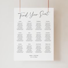 a seating chart hanging on a wall