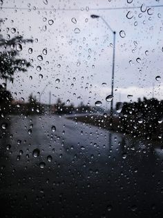 rain drops on the windshield of a car