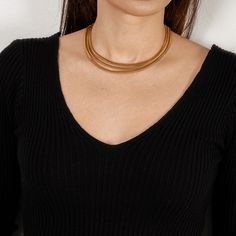 woman in 3-strand gold snake necklace and black shirt Adjustable Gold Necklace With Silk Cord, Elegant Metal Necklace With Adjustable Cord, Gold Silk Cord Necklaces As Gift, Gold Silk Cord Necklaces For Gifts, Gold Silk Cord Necklace For Gift, Elegant Silk Cord Necklace For Gift, Elegant Gold Necklace With Adjustable Cord, Elegant Choker Necklace With Adjustable Cord, Adjustable Gold Choker With Cord