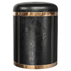 a black leather stool with gold trimmings on the top and bottom, against a white background