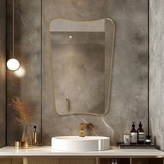 a bathroom with a sink, mirror and lights on the wall above it's counter