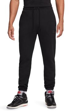 Casual and comfortable, these sweatpants made of cotton fleece sport an easy-moving fit and a trio of pockets for keeping essentials conveniently stowed. Elastic/drawstring waist Side-seam pockets; back welt pocket Elastic cuffs 100% cotton Machine wash, dry flat Imported Black Fleece Sweats With Pockets, Black Relaxed Fit Fleece Sweats, Versatile Black Sweatpants With 4-way Stretch, Functional Black Sweatpants With 4-way Stretch, 4-way Stretch Sweatpants With Pockets For Jogging, Fleece Sweatpants, Cotton Fleece, Fabric Gift Bags, Nordstrom Store