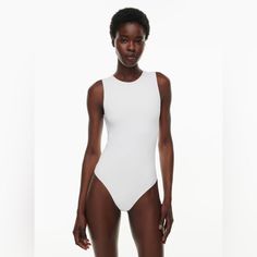 Aritzia Babaton Contour Bodysuit. Tags Attached. Never Worn. Size Medium White Tight-fitting Swimwear For Summer, White Second-skin Swimwear For Summer, White Fitted Sleeveless Bodysuit, White Sleeveless Fitted Leotard, White Fitted Sleeveless Leotard, Second-skin Sleeveless Beachwear Bodysuit, Sleeveless Second-skin Bodysuit Beachwear, Sleeveless Second-skin Bodysuit For Beachwear, White Second-skin One-piece Bodysuit