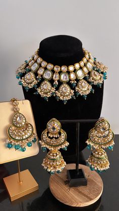 Trendy elegant green Kundan bridal set/ Indian bridal jewelry/ kundan and Polki jewelry/green tikka/ earrings. Necklace Earrings Tikka  ----------- CARE ----------- Caring for Kundan Bridal Set requires attention to detail to preserve its beauty and longevity. Here are some essential care instructions:  1. **Avoid Exposure to Moisture Keep your Kundan Bridal Set away from water, perfume, and other chemicals, as moisture can weaken the setting and dull the stones. 2. **Store Properly Store each p Indian Bridal Jewelry Kundan, Kundan Bridal Set, Indian Bridal Jewelry, Jewelry Kundan, Water Perfume, Polki Jewellery, Bridal Jewellery Indian, Wedding Jewellery Necklace, Bridal Set