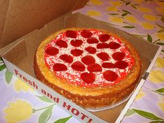 a pizza in a box on a table