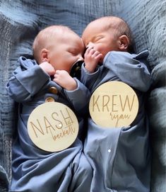 two baby babies are sleeping in blankets with name tags on their backs and the words, kash mam written on them