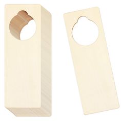 a pair of wooden door hangers with holes in them, one for each side