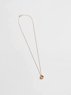 Elevate your style with the captivating allure of the Radiant Reverie Oval Necklace. Priced at $115.00 USD, this exquisite piece features an 18-inch 14k Gold-Filled curb chain adorned with a 14k Gold plated brass textured oval pendant, measuring 11mm. Crafted with recycled metals, this necklace seamlessly blends eco-consciousness with modern elegance, offering a radiant and dreamy accessory for those who appreciate timeless beauty. Modern Teardrop Pendant Necklace Tarnish Resistant, Modern Tarnish Resistant Oval Pendant Necklace, Modern Tarnish-resistant Teardrop Pendant Necklace, Minimalist Oval Link Necklace With Polished Finish, Modern Oval Necklace With Polished Finish, Modern Oval Pendant Necklace For Everyday, Modern Oval Tarnish Resistant Necklace, Modern Tarnish Resistant Oval Pendant Jewelry, Modern Tarnish-resistant Oval Pendant Jewelry