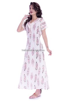 "This Beautiful Gown or can be called as Night Dress is made with super fine quality cotton Fabric. Usage - Gown, Maxi, Night Dress, Lingerie Cover Up , Sleepwear Fabric - 100% Cotton Color - White Pattern - Multi Color Floral Size - Fit Up to 2XL Length - 55\" Inch (140 CM), Bust - 44\" Inch ( 112 Cm), Hip - 52\" Inch (132 CM) Sleeve - 7\" Inch ( 18 Cm), Shoulder - 5\" Inch ( 13 CM), Weight - 0.180 Kg * Gown has Drawstring on the Back side for Perfect Fit. * Gown has a Zipper on Front side for White Cotton Dress For Home, White Cotton Home Dress, White V-neck Dress, White Short Sleeve Nightgown For Sleepover, Maxi Length Sleepwear For Spring, White Summer Nightgown For Hospital, Cotton Maxi Length Sleepwear For Loungewear, White V-neck Sleepwear For Sleepover, Cotton Maxi Sleep Dress