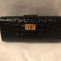 Nwt Elegant Cc Skye Black Leather Crocodile Embossed Clutch. Black Fabric Interior. Flap Closure With Gold Tone Turn Lock Closure At Front. Structured Bag With Rounded Corners. Embossing Is Raised On Front And Back. Large Enough For Phone, Cosmetics, Cards And Keys. Includes Generic Dust Bag. Party Leather Bag With Crocodile Pattern, Black Rectangular Clutch For Formal Occasions, Elegant Evening Bag With Crocodile Pattern, Black Rectangular Case Evening Bag For Formal Occasions, Formal Leather Clutch In Rectangular Case, Leather Clutch For Formal Occasions, Black Rectangular Evening Bag For Formal Occasions, Leather Rectangular Evening Bag, Classic Evening Bag With Crocodile Pattern