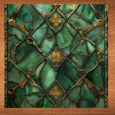 an ornate stained glass window with gold accents