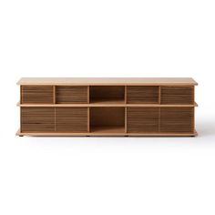 the sideboard is made out of wood and has two compartments for storage, one with shutters