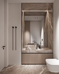 a bathroom with a sink, toilet and mirror in the wall next to each other