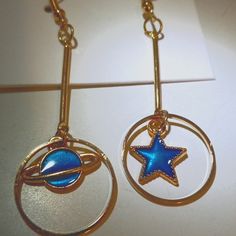 One Of A Kind. The Moon And Star Dangle Within Their Circle Shining Different Shimmers Of Blue And Turquoise. Includes Backings. Approx. 2" In Length. Only Took Out A Package To Take Pictures Moon And Star, Moon Star, Take Pictures, Stars And Moon, Earrings Gold, Midnight Blue, Blue Gold, Fashion Earrings, The Moon