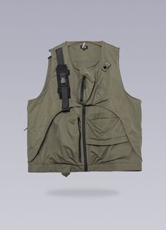 Give a new dimension to your wardrobe with this techwear tactical vest. Unveil the newest evolution in urban fashion - the Futuristic Vest. This innovative piece is far from ordinary, meticulously designed to redefine the standards of style and functionality. It embodies futuristic wear, a transformative gear for those who refuse to blend into the crowd, an invitation to embrace the futuristic style. Crafted to elevate your techwear outfits, this vest is a design masterpiece steeped in Japanese Streetwear and alternative fashion aesthetics. It speaks to young urbanites, those who appreciate the intricate beauty of standout and functional clothing that serves them all year round. The elegance of this futuristic vest for men lies in its dual-layered construction, a silhouette that adds depth Sleeveless Techwear Vest For Outdoor Activities, Techwear Sleeveless Vest For Outdoor Activities, Techwear Vest With Functional Pockets For Outdoor Activities, Urban Vest With Cargo Pockets For Streetwear, Sleeveless Techwear Outerwear For Streetwear, Sleeveless Outerwear With Functional Pockets For Streetwear, Functional Vest For Streetwear, Functional Sleeveless Vest For Streetwear, Techwear Nylon Vest For Streetwear