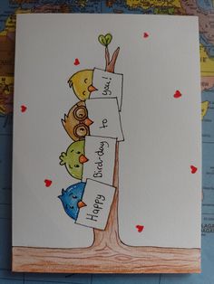 a card with three little birds sitting on top of each other and the words i love you