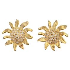 Vintage Gold Tone and Diamante Sun Flower Earrings, Circa 1980's. These are well made and substantial earrings The earrings have a dome of the diamante in the center. All the petals are free form and going various directions to create the perfect flower. These are the perfect 1980's earrings. Quite special and unusual. Clip on. Flower Earrings, Clip On, Vintage Gold, Clip On Earrings, Gold Tones, Jewelry Earrings, Sun, For Sale, Flowers