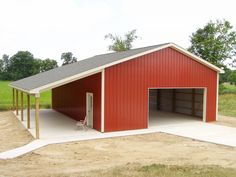 a red garage with a white door on the side