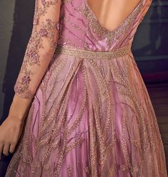 COLOR : Charm Pink FABRIC : Top - Net, Bottom (Lehenga) - Satin, Inner - Santoon, Dupatta - ChiffonWORK : Heavy Resham Work, Tonal Glitter Cord, Sequins, Stones, Motifs, Lace Border OCCASION : Wedding, Reception, Engagement READY-TO-WEAR : NoSTITCHING : Available as semi-stitched fabric, can be stitched using standard size option (+$30). Note: There might be a slight color variation due to lighting and flash used during photoshoot. The bright shade seen is the best closer view of fabric's color. Anarkali Evening Dress With Resham Embroidery For Wedding, Festive Evening Dress With Zari Work For Wedding, Festive Wedding Evening Dress With Zari Work, Embroidered Floor-length Ball Gown For Party, Embroidered Ball Gown For Party, Festive Embroidered Evening Dress For Reception, Pink Anarkali Lehenga For Evening, Festive Anarkali Evening Dress With Resham Embroidery, Floor-length Embroidered Evening Dress For Reception