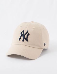 the new york yankees'47 cleanout cap is shown in beige and navy blue