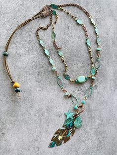 Turquoise and copper Boho necklace with beautiful Koi fish pendant    - Long double-strand necklace     - Meticulously hand-crafted to ensure beauty and quality    - Repurposed and up-cycled gems mixed with modern materials    - Sliding closure allows length adjustment (from 20 to 30 inches)  Arrives in a pretty organza bag, ready for gift giving. Giving Back: A portion of all Hey Judi proceeds is donated to A Good Cup International, an organization dedicated to empowering and cultivating self-w Spiritual Turquoise Necklace With Lobster Clasp, Turquoise Necklace With Lobster Clasp For Jewelry Making, Bohemian Wire Wrapped Turquoise Pendant Necklace, Handmade Turquoise Dangle Necklace, Handmade Bohemian Multi-strand Turquoise Necklace, Adjustable Multi-strand Turquoise Necklace Gift, Handmade Turquoise Lariat Jewelry, Artisan Double Strand Turquoise Jewelry, Spiritual Turquoise Necklace With Patina